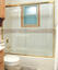 framed tub enclosure with sliding door