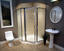 hexagonal framed shower enclosure with glass rain swinging door