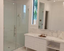 heavy glass enclosure with mirror