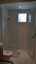 in-line frameless shower enclosure