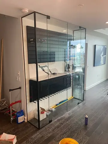 Glass wine case with black hardware by Glass Doctor of Nashville.
