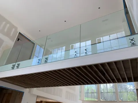 A custom glass panel railing created by Glass Doctor of Nashville.