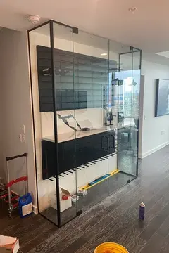 Glass wine case with black hardware by Glass Doctor of Nashville.